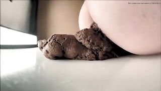 Dark huge chocolate turd on the table