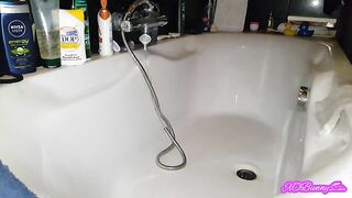 Dark sexy poop in the bathtub