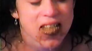 Nasty brunette gal eating fresh sweet shit