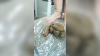 Chubby busty gal pooping on the plate