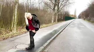 Naughty blonde lady poops on the road