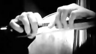 Man shoves a giant dildo in his ass