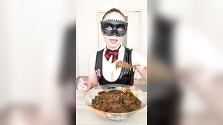 Man eats shit off a spoon from a bowl