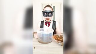 Man eats shit off a spoon from a bowl