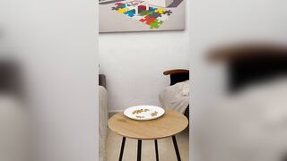 Girl takes a huge shit on a plate on the table