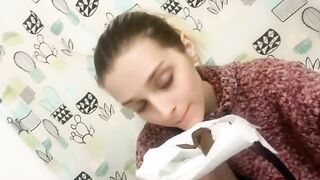 Watch sexy brunette girl sniffing her shit