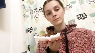 Watch sexy brunette girl sniffing her shit