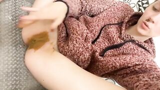 Watch sexy brunette girl sniffing her shit