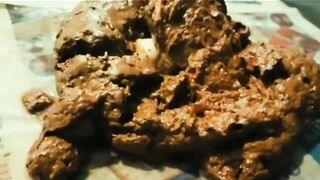 Blonde MILF showing ass while shitting huge log