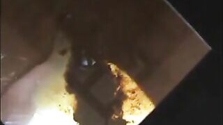 Woman shit and piss on a mirror table