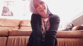 Woman takes a shit in a pink diaper on the floor