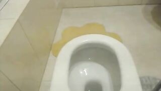 Nasty amateur lady poops in the toilet