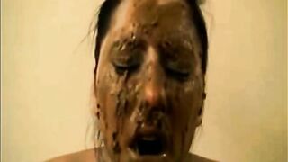 Amazing slut smearing shit on the face