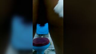 Asian cute girl pooping and squatting