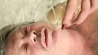 Bavarian blonde Mistress plays with her slave