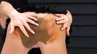 Woman spreads her ass cheeks and shows off her shit