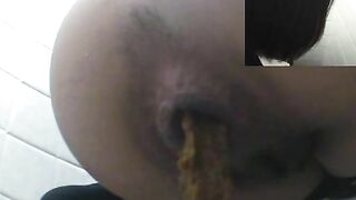 Woman spreads her ass and shows shit on her asshole
