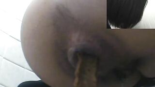 Woman spreads her ass and shows shit on her asshole