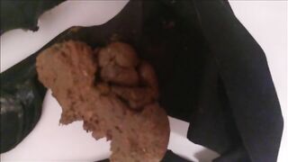 Black panties filled with shit
