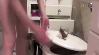 Blonde shitting in a glasses and showing her yummy asshole