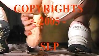 Chick playing with huge dildo while smearing shit