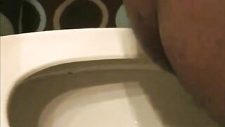 Thick ass ebony girl pooping in the toilet