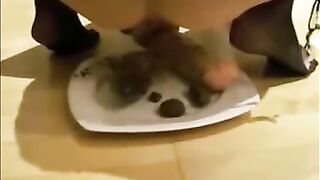 Girl masturbating asshole with dildo while shitting