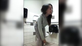 Brunette pooping on public toilet