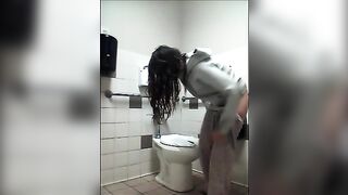 Brunette pooping on public toilet