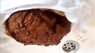 Shitting a big load on her white panty