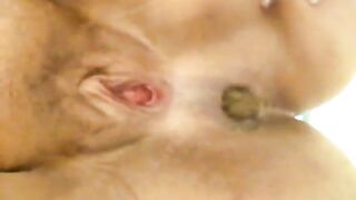 Woman plays with shit in her asshole
