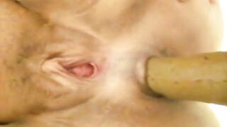 Woman plays with shit in her asshole