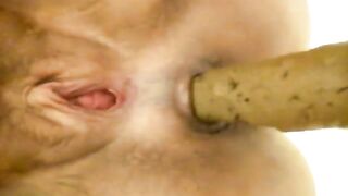 Woman plays with shit in her asshole