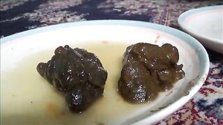 Woman squats and spreads her ass cheeks