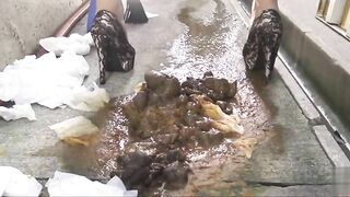 Woman takes a huge shit in the bathtub and steps in it