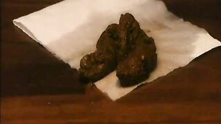 Jenniffer shiting out a huge turd on the floor