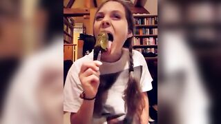 Lunatic cute chick eats a scatcicle