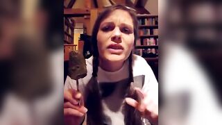 Lunatic cute chick eats a scatcicle