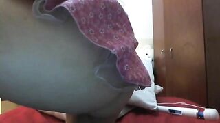 Playing with her shaved asshole