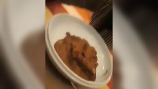 Same crazy chick eating a plate of fresh shit