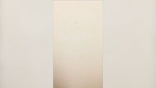 Girl takes a shit while laying on her back in the bathtub