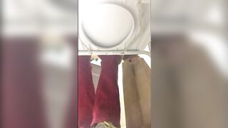 Cute looking chick poops in the toilet
