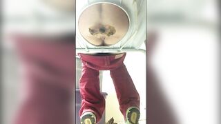Cute looking chick poops in the toilet