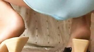 Shitting through her white panties