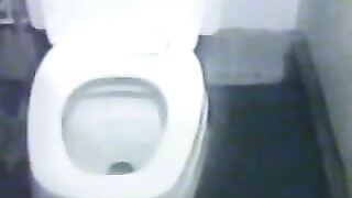 Splashing shit on her toilet seat