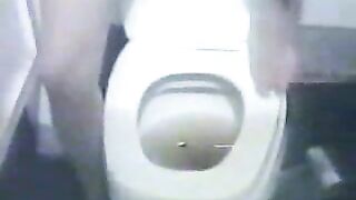 Splashing shit on her toilet seat