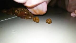 Young slave obeys her mistress for eating shit