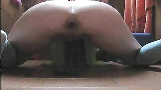Big assed woman squatting and shitting on the floor