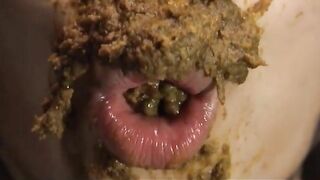 Woman eats shit off a plate with her tits