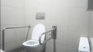 Girl squats on the edge of the toilet and takes a huge shit